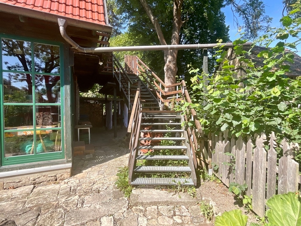 Treppe zum 1. Obergeschoss